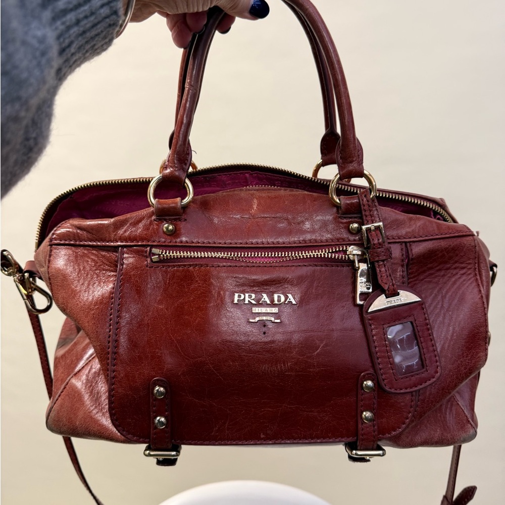 Prada Red Leather Tag with Gold Accents